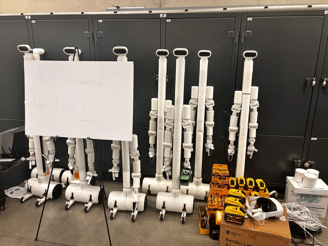 BracketBot robots and batteries lined up at the Hack the North venue